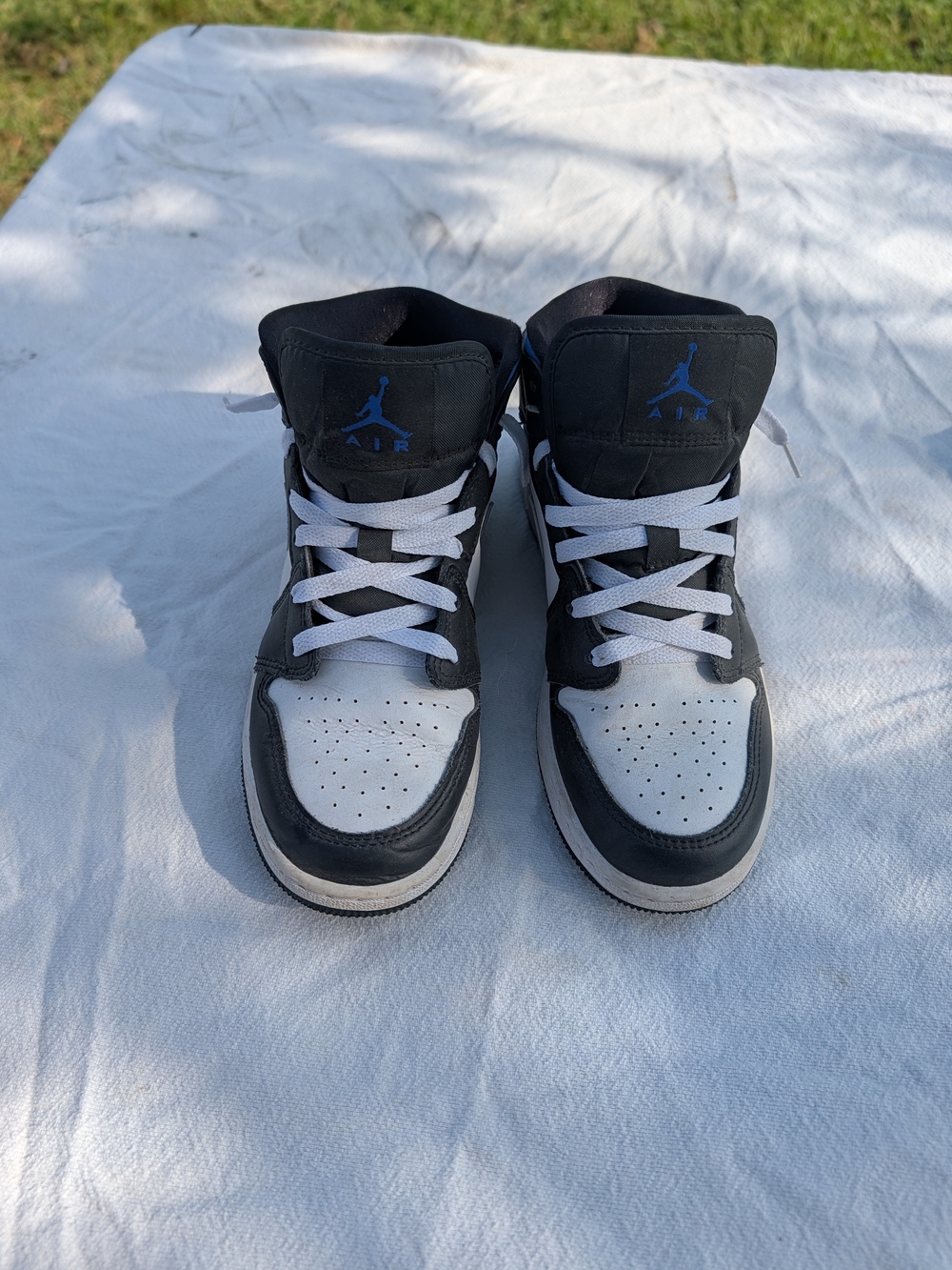 Jordan Black White and Blue High-Top Sneakers